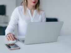 woman-using-silver-laptop-2265488