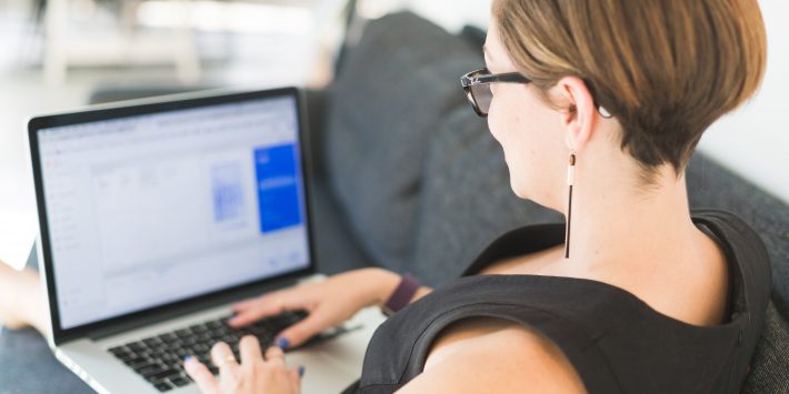 woman-working-on-office-sofa