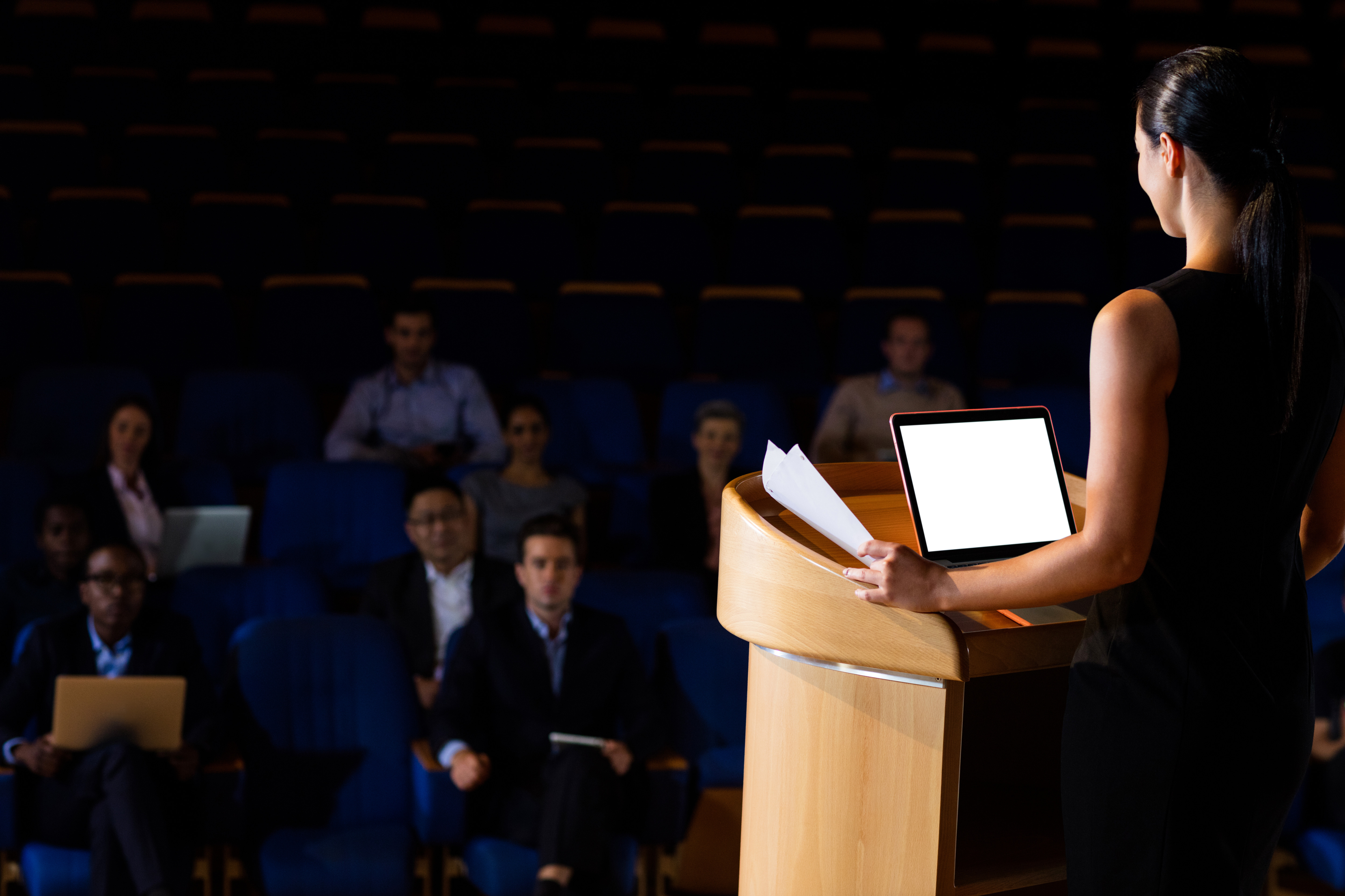 pikwizard-female-business-executive-giving-a-speech