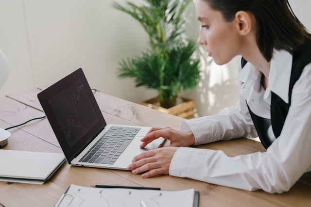 Photo by Mikhail Nilov: https://www.pexels.com/photo/a-woman-looking-at-a-chart-on-the-laptop-screen-7677898/