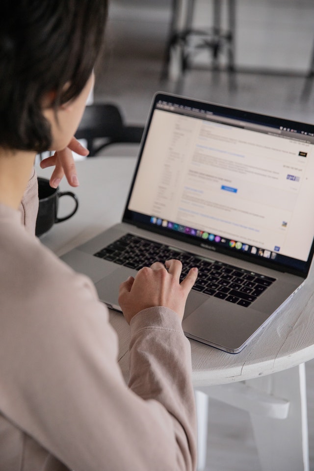 Photo by EKATERINA BOLOVTSOVA: https://www.pexels.com/photo/crop-unrecognizable-businesswoman-typing-on-laptop-at-home-4050216/